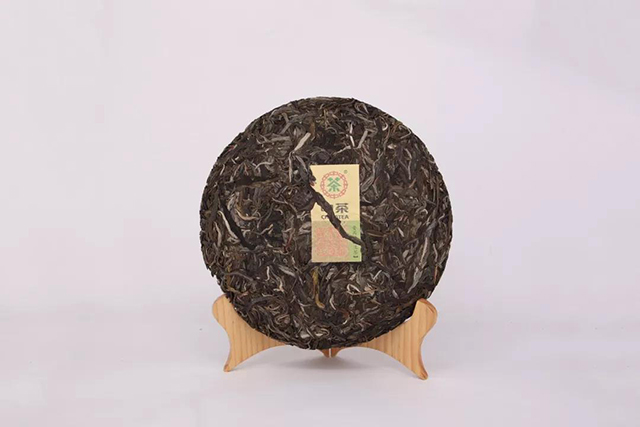 中茶乌金圆茶普洱茶生茶饼形