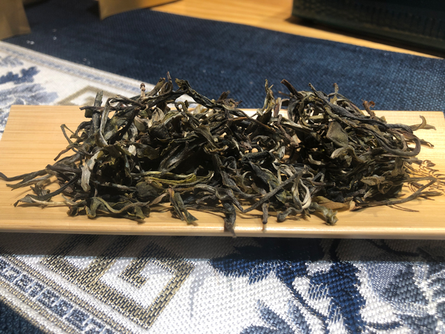 蓝版摆尾箐普洱茶小饼