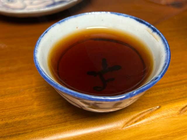 图为红版2020金魁熟普小饼品茗头道茶汤