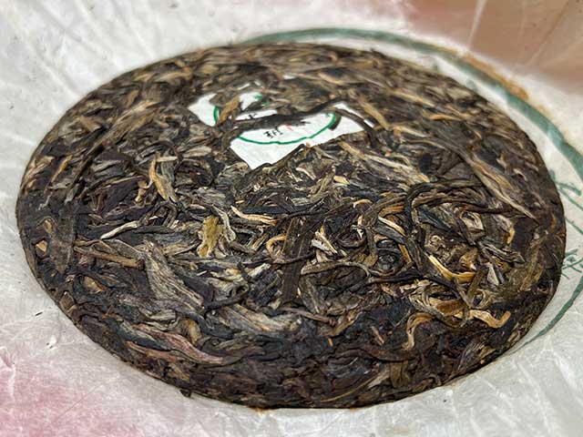 图为私藏茶2002年班章小青饼250克饼