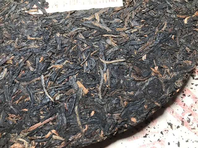 下关2005年繁体云厚纸T8653铁饼普洱茶品质特点