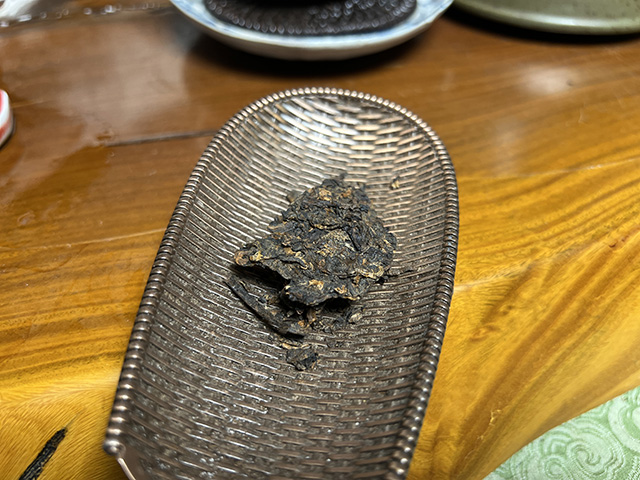 图为沪上老茶人样品纯干仓石昆牧制熟茶