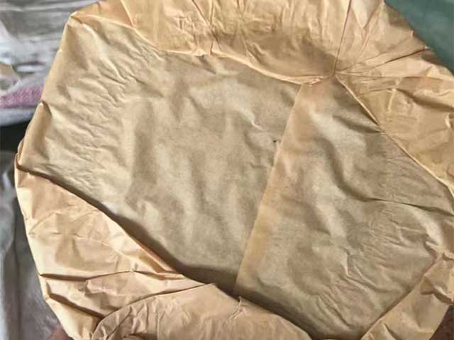 图为春城茶厂1989年福字饼铁饼熟茶