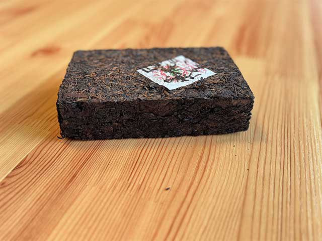 图为云南勐海普洱砖茶1997年500克熟茶砖