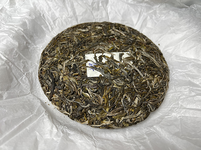 图为蓝版2025摆尾箐普洱茶小饼