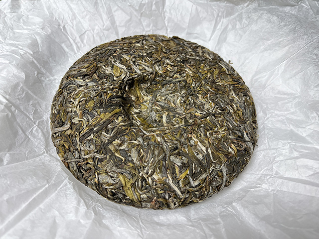 图为蓝版2025摆尾箐普洱茶小饼