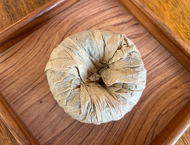 图为昆明茶厂90年代9016熟沱大写版